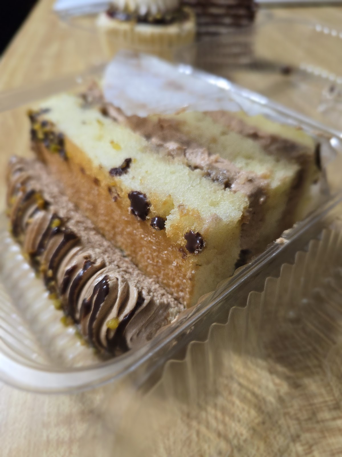 A close-up of soft European layer cake slices from Aliona's Euro Bake